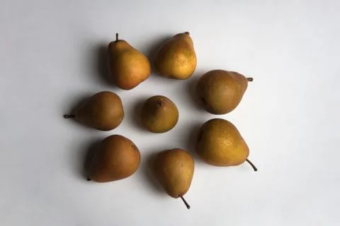 Ripe pears composition on white background Stock Photos