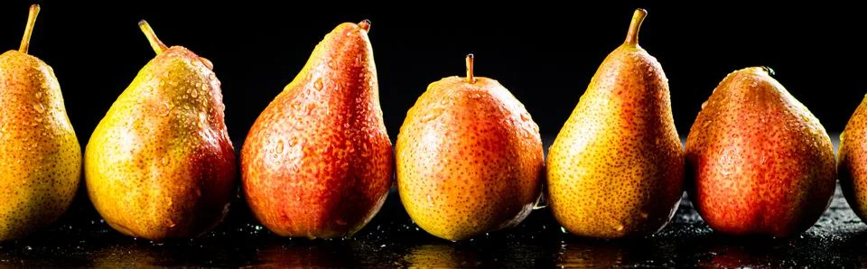 Ripe pears on the table. Stock Photos