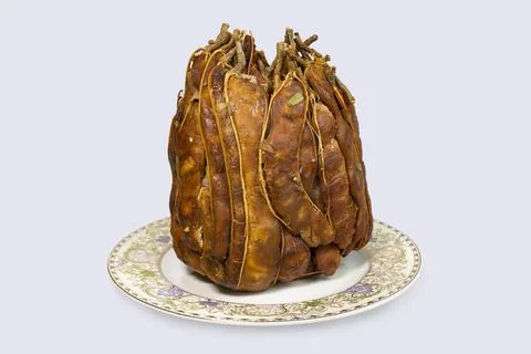 Ripe peeled Tamarind stack on white background. Scientific name Tamarindus in Stock Photos