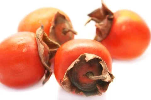 Ripe persimmons Stock Photos