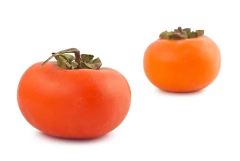 Ripe persimmons Stock Photos
