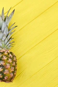 Ripe pineapple and text space. Stock Photos