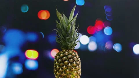 Ripe pineapple rotating on glitter theme Stock Footage 141603258