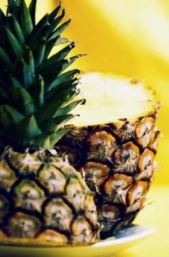 Ripe pineapple with slices Stock Photos