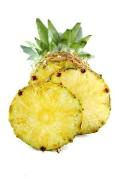 Ripe pineapple with slices Stock Photos