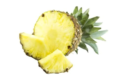 Ripe pineapple with slices Stock Photos