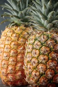 Ripe pineapple on the table Stock Photos