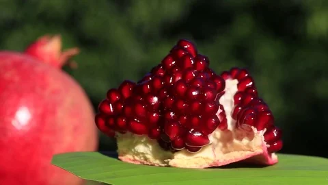 Ripe pomegranate fruit segment rotates . Fresh, red garnet close up, Turkey Stock Footage 81730854