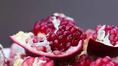 Ripe pomegranate rotating - close up view. Stock Footage 167333799