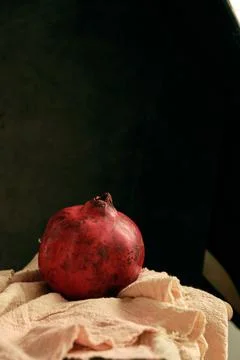 Ripe pomegranate on the table 스톡 사진