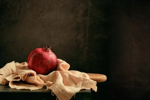 Ripe pomegranate on the table Stock-Fotos