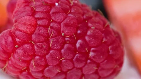 Ripe raspberries macro view. The texture of fresh raspberry. Fruit background. Stock Footage 302040852