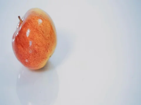 Ripe red and yellow apples, rotates on white background Stock Footage 73806950