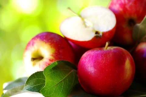 .ripe red apples on table Stock Photos