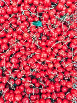 Ripe red cherries pattern background Stock Photos