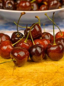 Ripe red cherries on the table close-up. Stock Photos