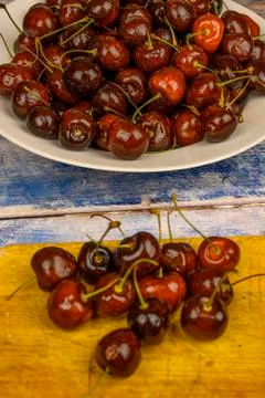 Ripe red cherries on the table close-up. Stock Photos