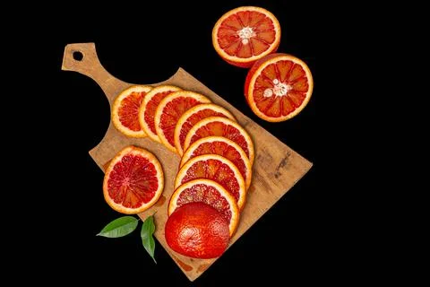 Ripe red oranges on dark background, top view Foto stock