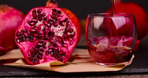 Ripe red pomegranate on the table, fresh and sweet ripe red pomegranate Stock Footage 263614943