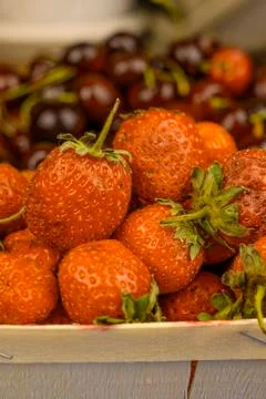 Ripe red strawberries on the table close-up. Stock Photos