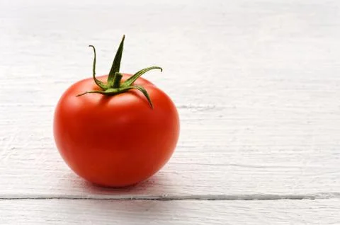 Ripe red tomato Stock Photos