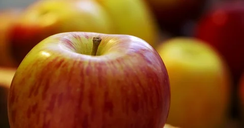 A ripe red-yellow apple rotates around its axis 库存影片 116617536