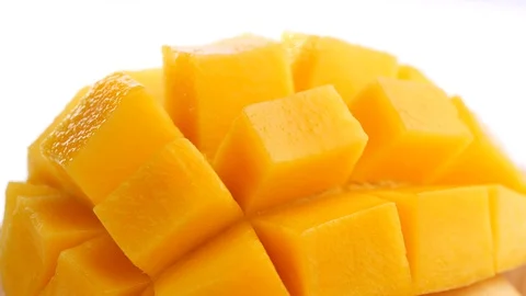Ripe Sliced Mango Squared rotation in 4k slow motion Stock-Footage 129650371