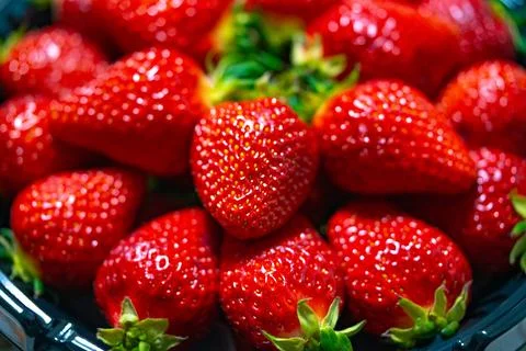 Ripe strawberries close-up as a texture background Fotos Stock