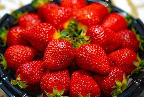 Ripe strawberries close-up as a texture background Stock-Fotos