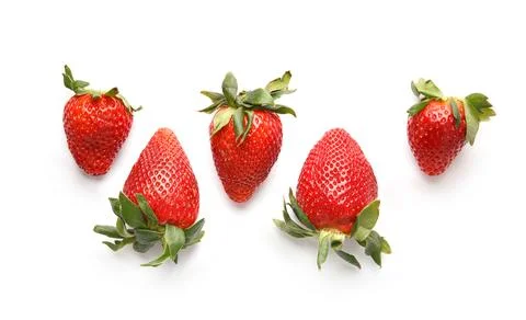 Ripe strawberries isolated on white background top view. Stock Photos