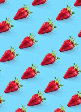 Ripe strawberries pattern. Food pattern. Blue background. Vertical 스톡 사진
