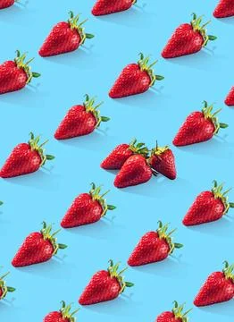 Ripe strawberries pattern. Food pattern. Blue background. Vertical 写真素材
