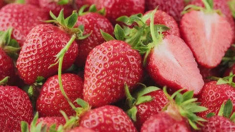 Ripe strawberries rotate macro Stock Footage 133442664