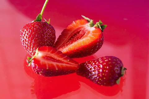 Ripe strawberries on a solid background, healthy vegetarian food. Beautiful Stock Photos