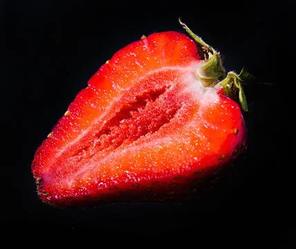 Ripe strawberries on a solid background, healthy vegetarian food. Beautiful Stock Photos