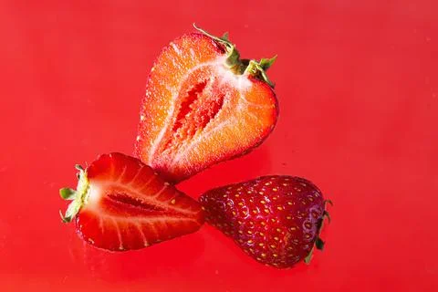 Ripe strawberries on a solid background, healthy vegetarian food. Beautiful Stock Photos