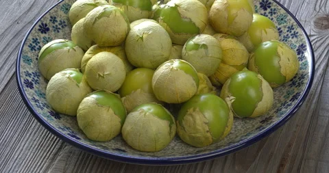 Ripe tomatillos on a plate. Stock Footage 279769151