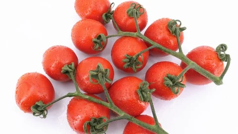 Ripe tomatoes rotating (loopable) on white background. Stock Footage 113645022