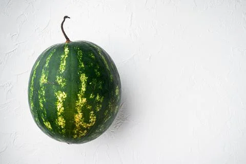 Ripe Watermelon , on white stone table background, with copy space for text Stock Photos