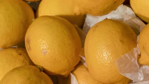 Ripe Yellow Lemons Close-up Background Stock Footage 137830010