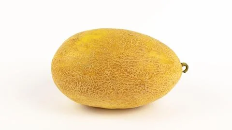 Ripe yellow melon on a white background. 库存照片