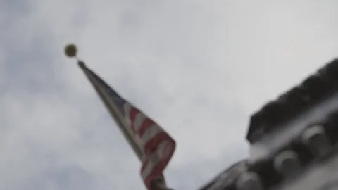 Ripped American Flag Waving in the Wind Stock Footage 148749959