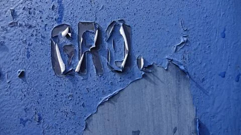 Ripped blue cargo container wall text Stock Photos
