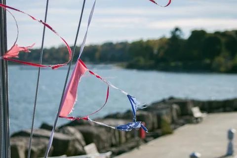 Ripped Flags Blowing in the Wind Foto stock
