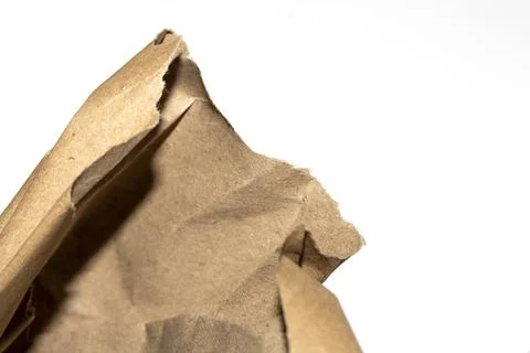 Ripped Up Torn Cardboard Box Packaging with Ridges on White Background Stock Photos