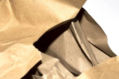 Ripped Up Torn Cardboard Box Packaging with Ridges on White Background Stock Photos
