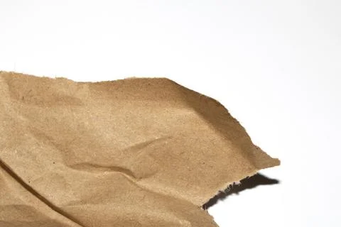 Ripped Up Torn Cardboard Box Packaging with Ridges on White Background Stock Photos