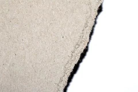 Ripped Up Torn Cardboard Box Packaging with Ridges on White Background Stock Photos
