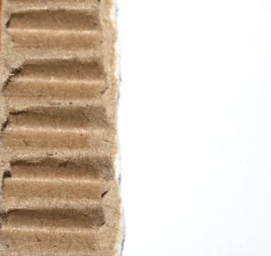Ripped Up Torn Cardboard Box Packaging with Ridges on White Background Stock Photos