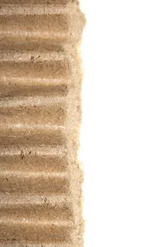 Ripped Up Torn Cardboard Box Packaging with Ridges on White Background Stock Photos